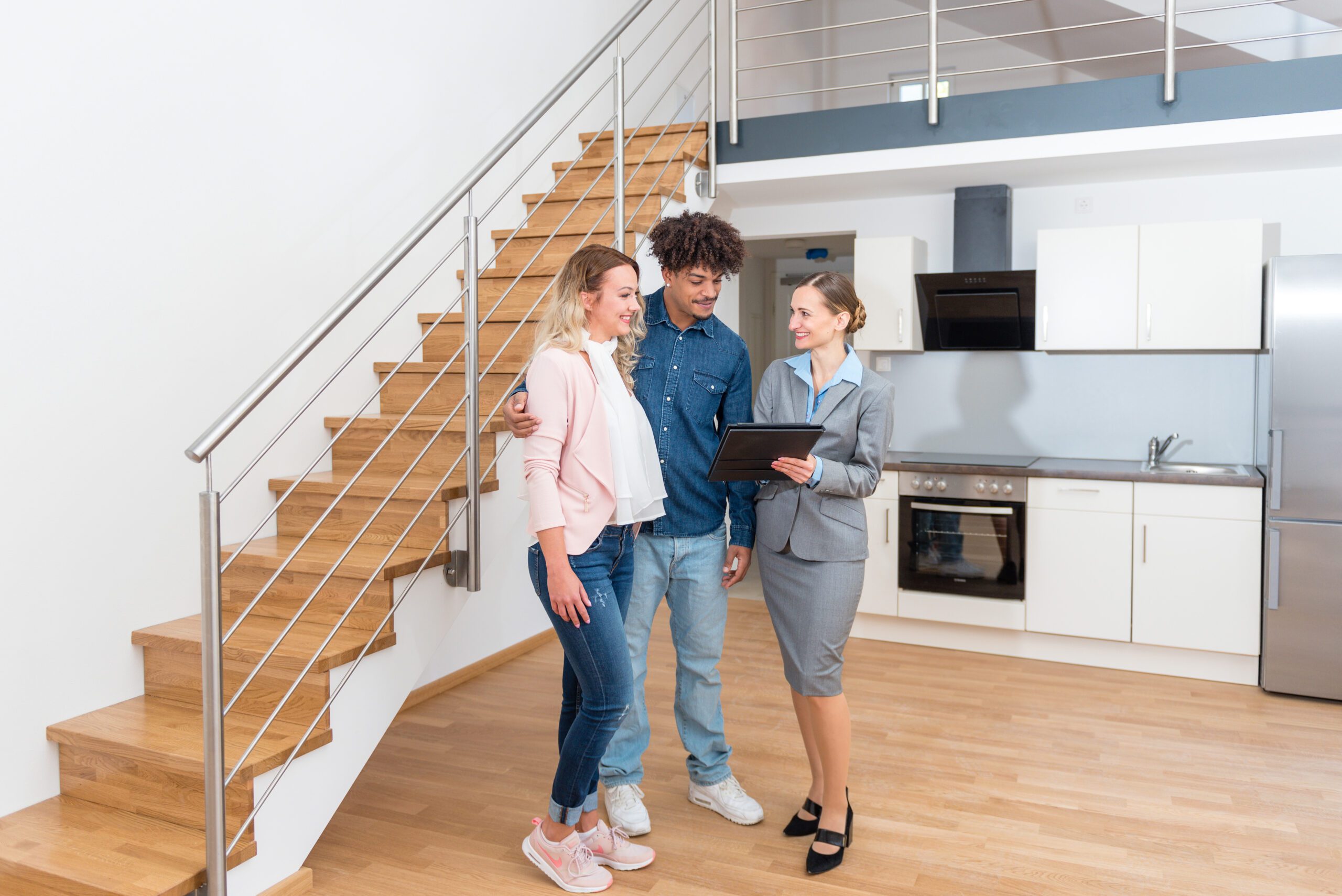 Young Couple Getting Tour Through Apartment They Consider Renting